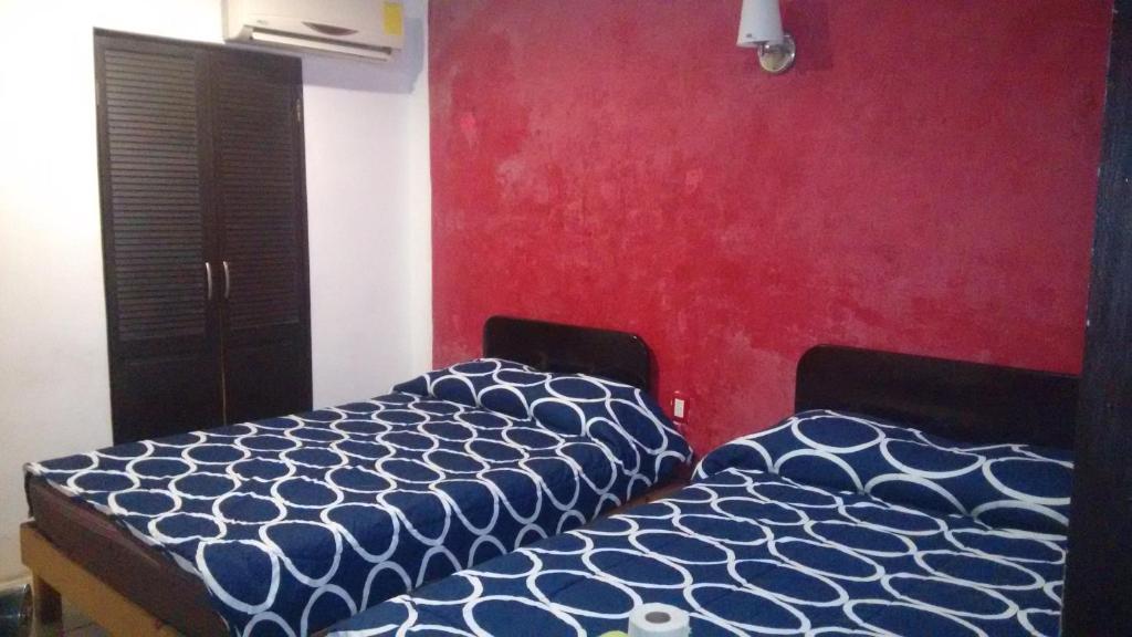 Postel nebo postele na pokoji v ubytování Hotel Marina Campeche