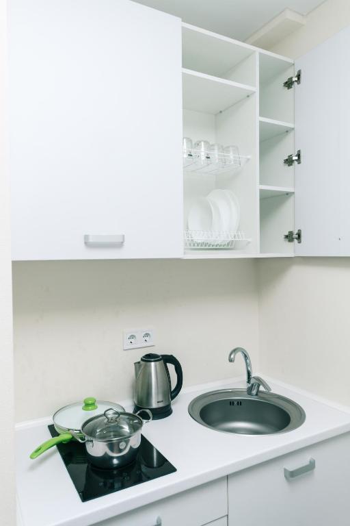 Kuchyň nebo kuchyňský kout v ubytování FlatRent SmartHouse