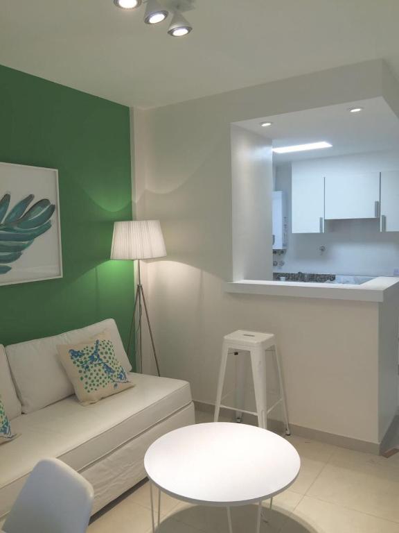 Kuchyň nebo kuchyňský kout v ubytování 9 de Julio Park Suites