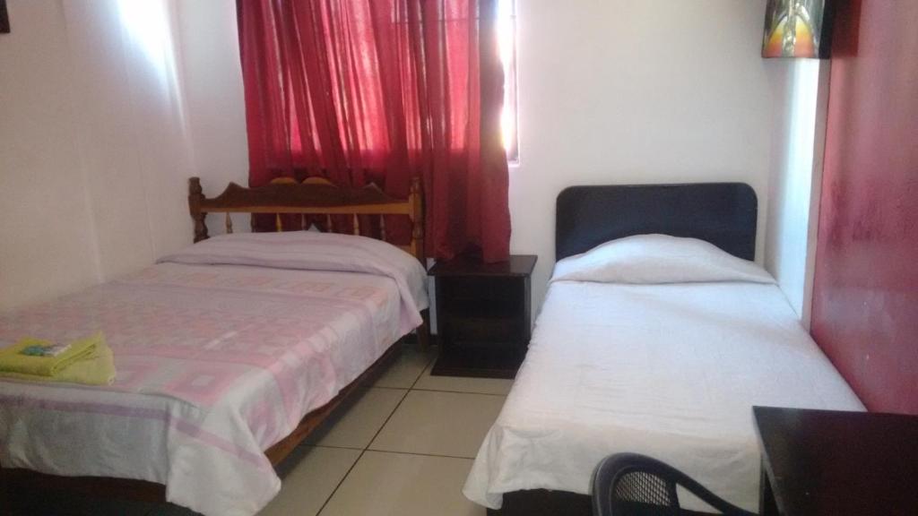 Postel nebo postele na pokoji v ubytování Hotel Marina Campeche