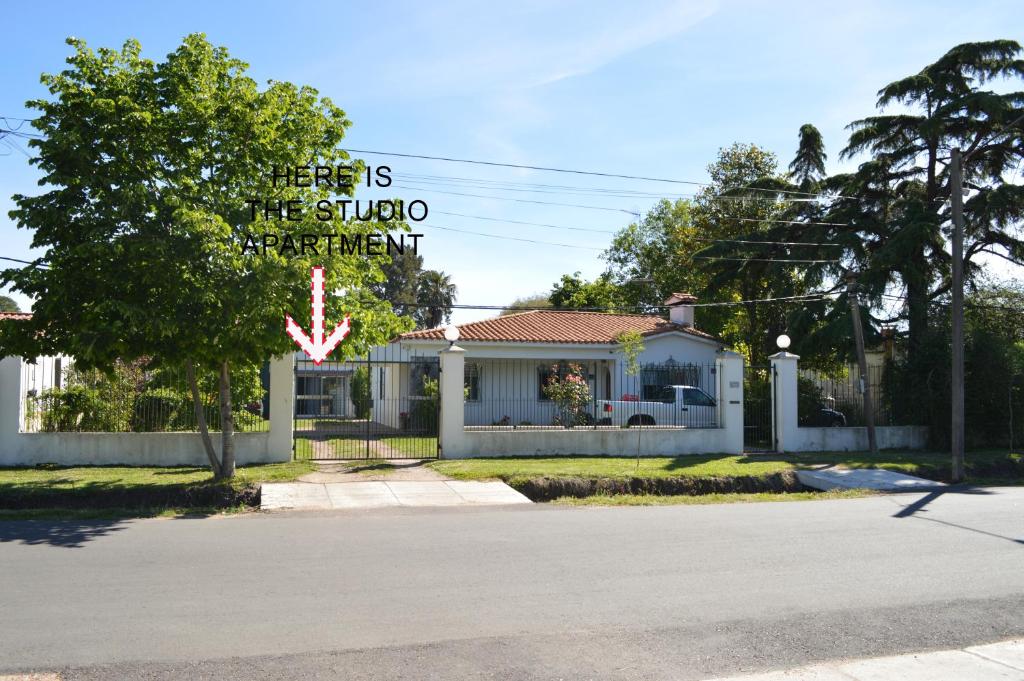 a building with a sign that says tigers the studio apartment at Montevideo al oeste, algo distinto... in Colón