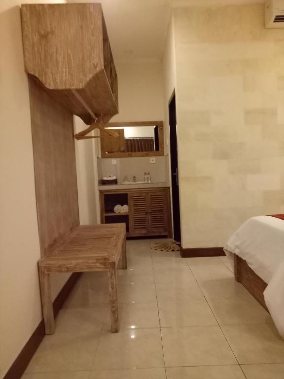 Postel nebo postele na pokoji v ubytování Umah Dajane Guest House