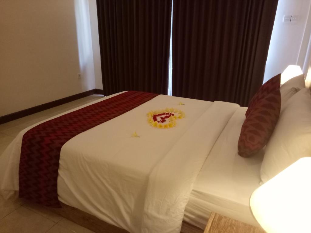Postel nebo postele na pokoji v ubytování Umah Dajane Guest House