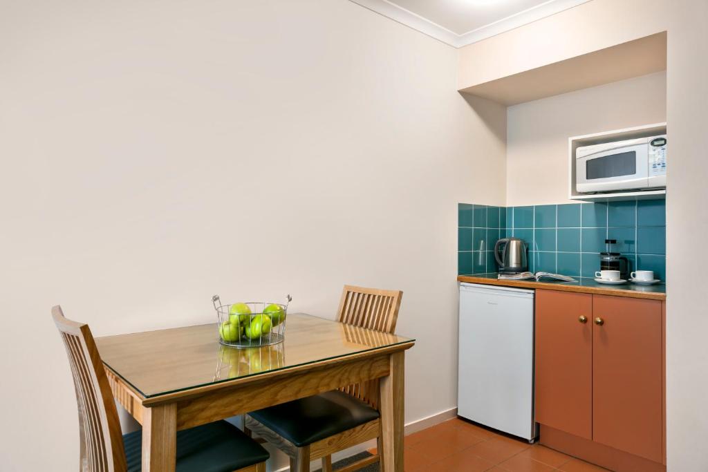 Kuchyň nebo kuchyňský kout v ubytování Hobart Waterfront Apartments