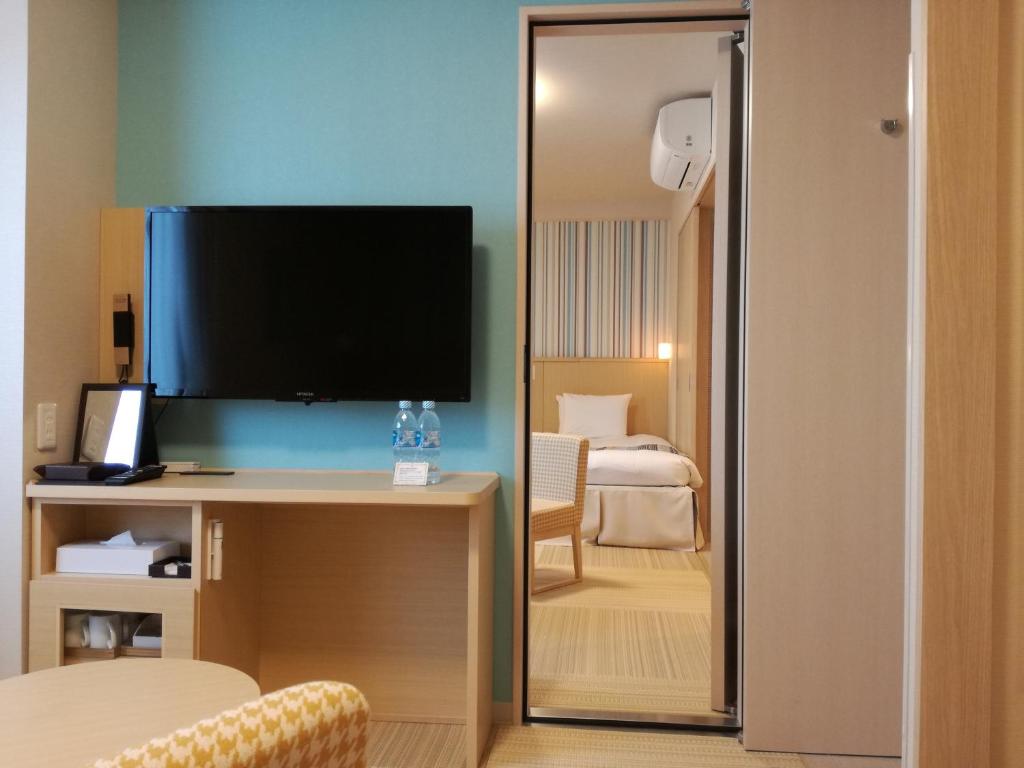 TV a/nebo společenská místnost v ubytování Hiyori Hotel Maihama