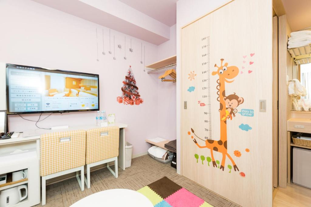 TV a/nebo společenská místnost v ubytování Hiyori Hotel Maihama
