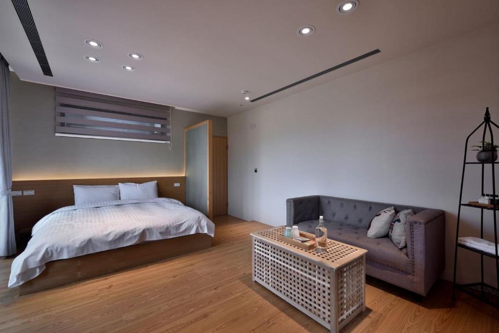 Postel nebo postele na pokoji v ubytování Shan Yi Fang Resort