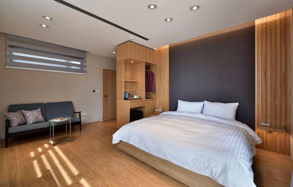 Postel nebo postele na pokoji v ubytování Shan Yi Fang Resort