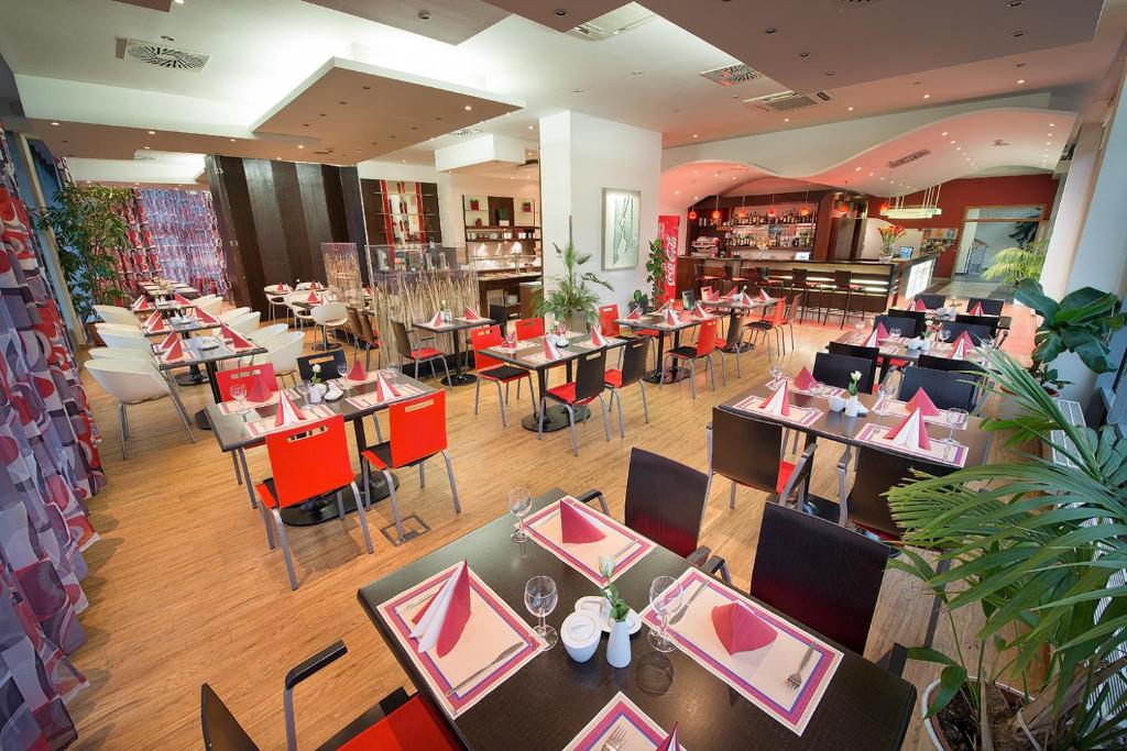 Restauracja lub miejsce do jedzenia w obiekcie Rezidence Emmy