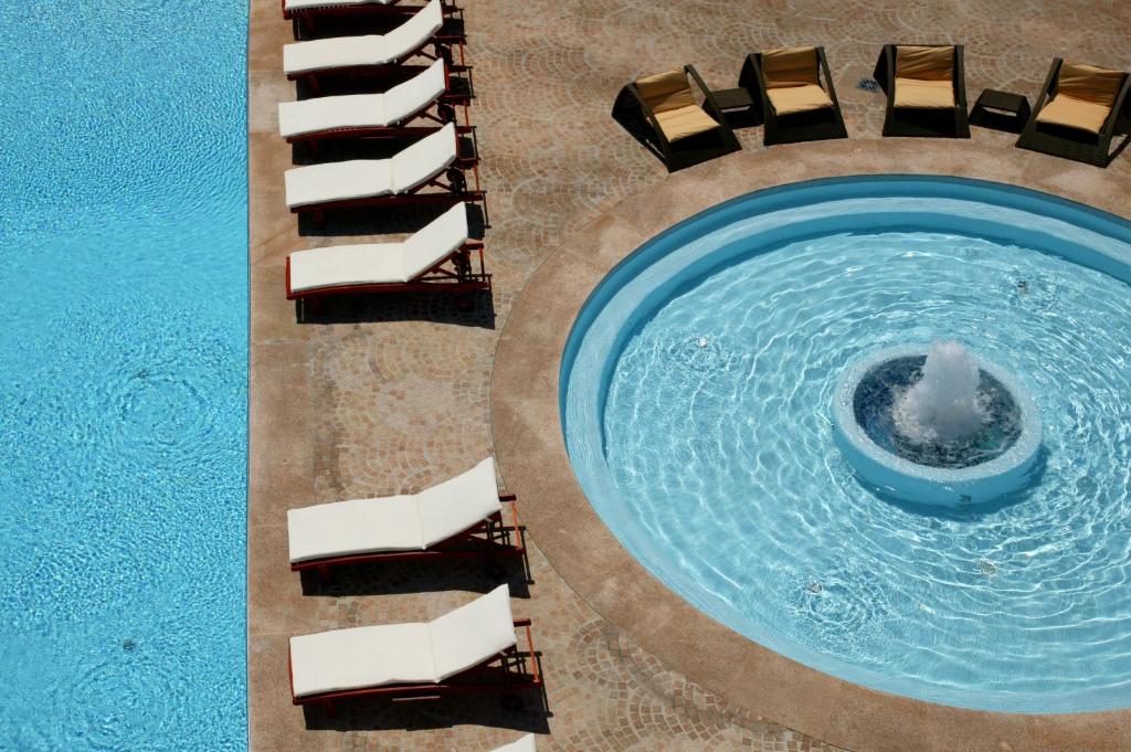 Bazén v ubytování Arena Regia Hotel & Spa - Marina Regia Residence nebo v jeho okolí