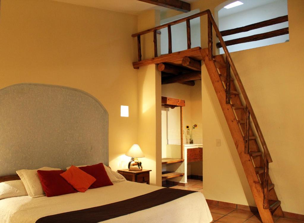 Posteľ alebo postele v izbe v ubytovaní Hotel Posada Real Tapalpa