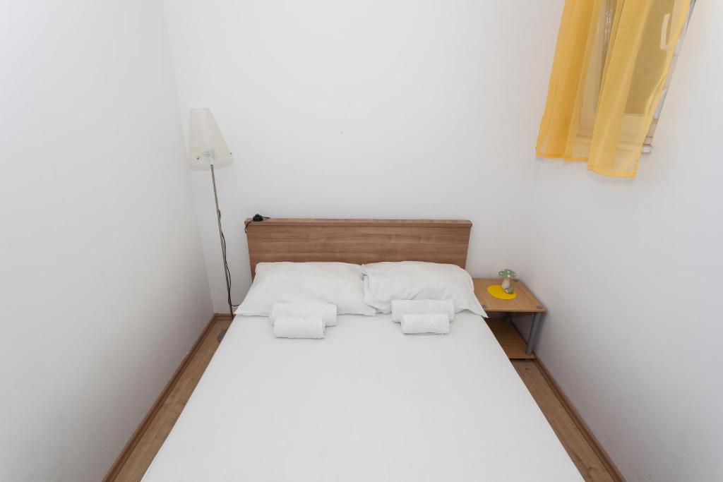 Posteľ alebo postele v izbe v ubytovaní Apartment Dome