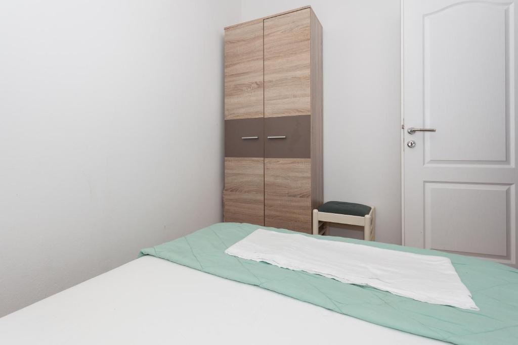 Posteľ alebo postele v izbe v ubytovaní Apartment Dome