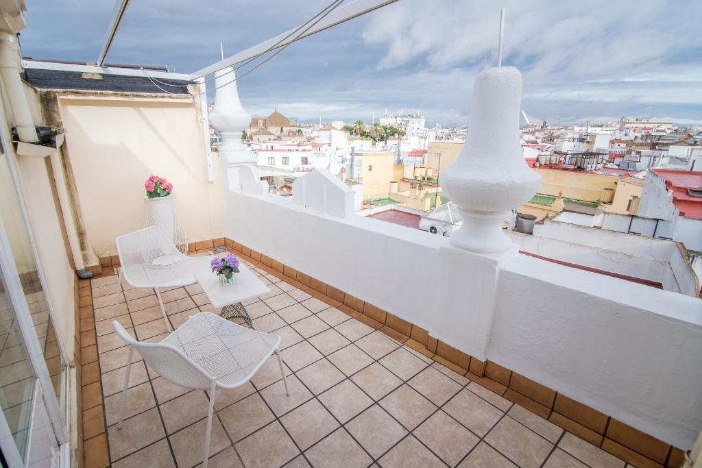 A balcony or terrace at Petit Palace Canalejas Sevilla