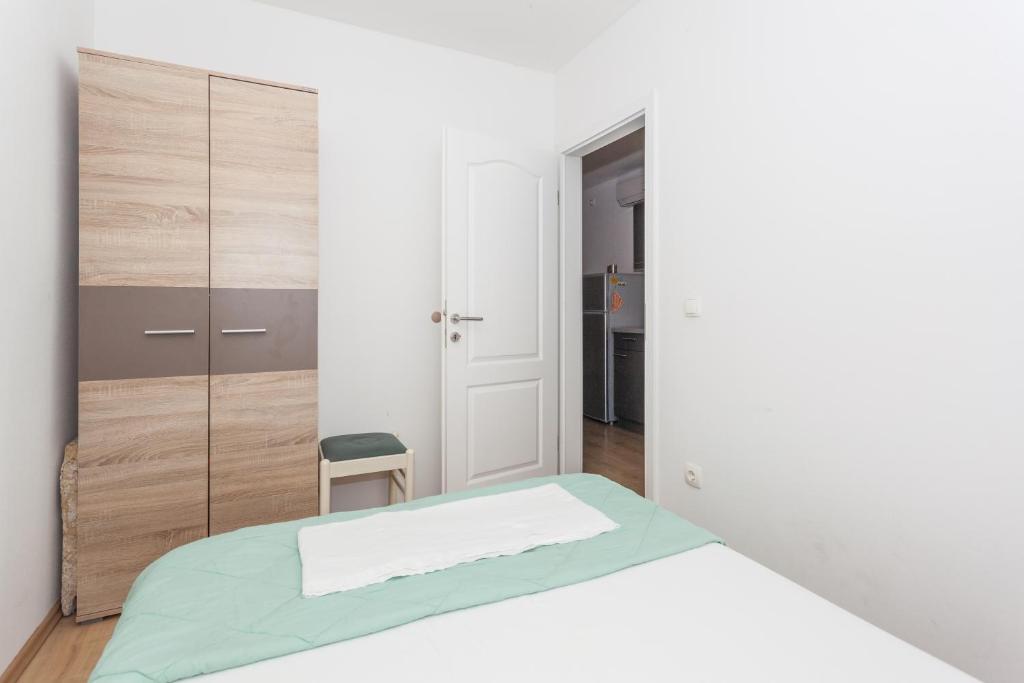 Posteľ alebo postele v izbe v ubytovaní Apartment Dome
