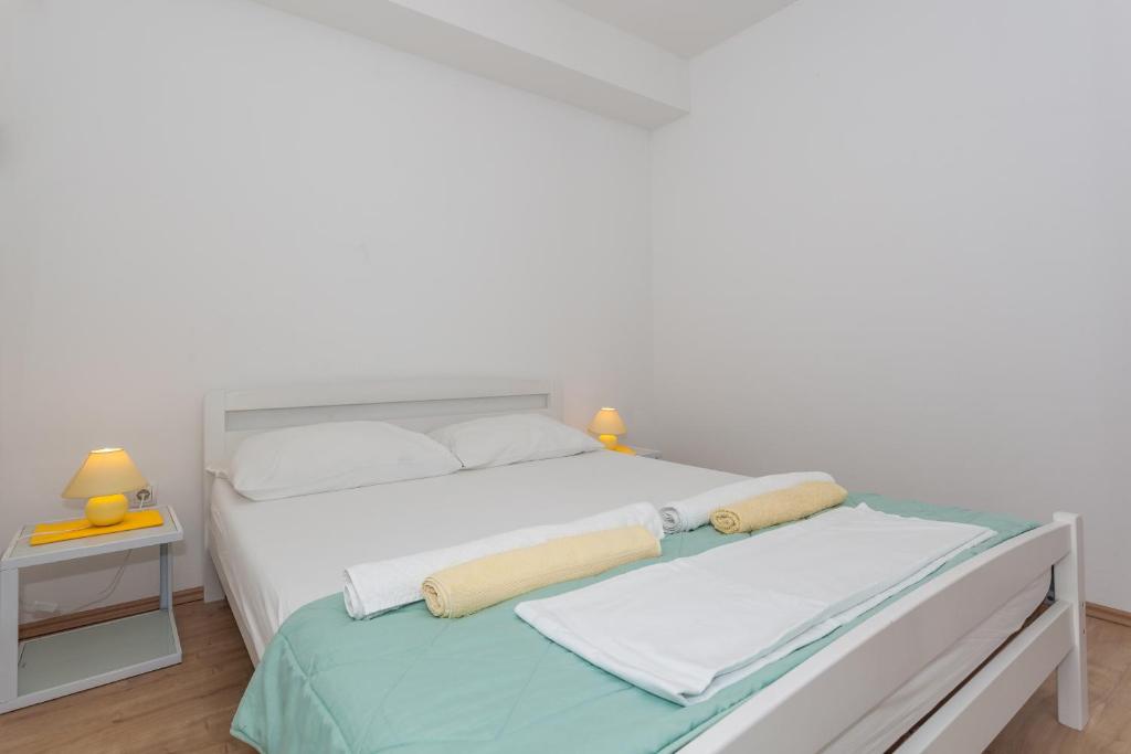 Posteľ alebo postele v izbe v ubytovaní Apartment Dome