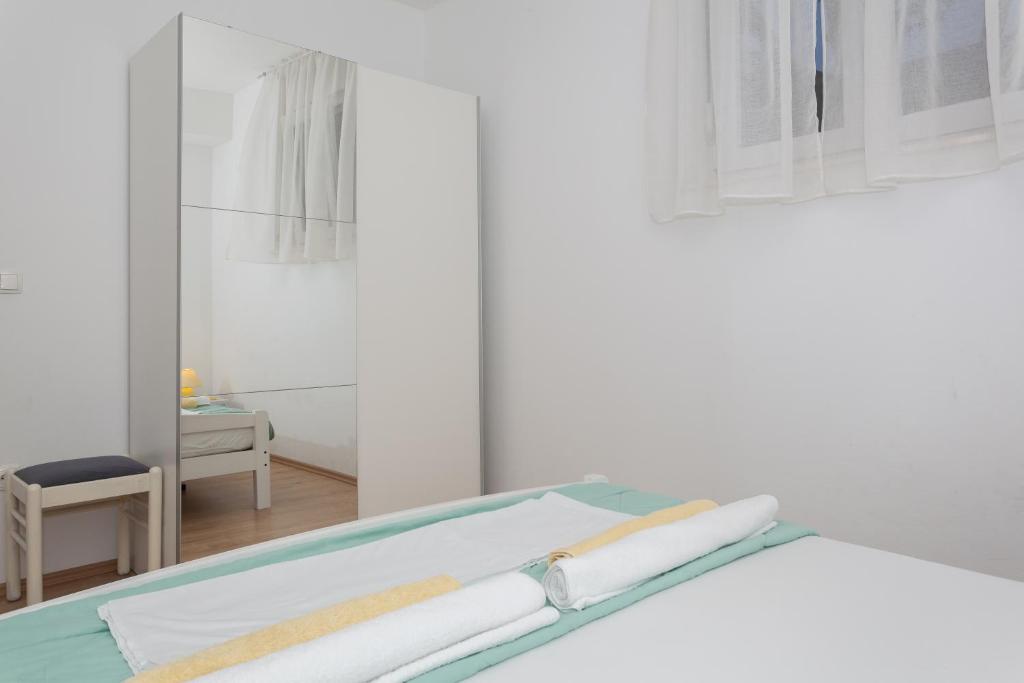 Posteľ alebo postele v izbe v ubytovaní Apartment Dome