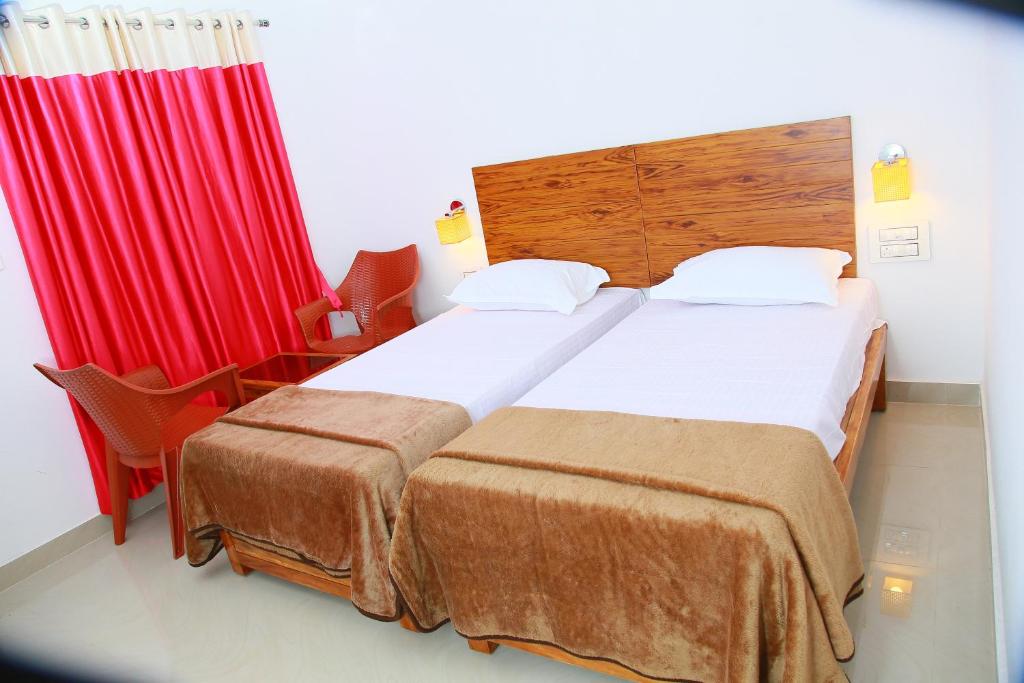 Postel nebo postele na pokoji v ubytování Agape Marari