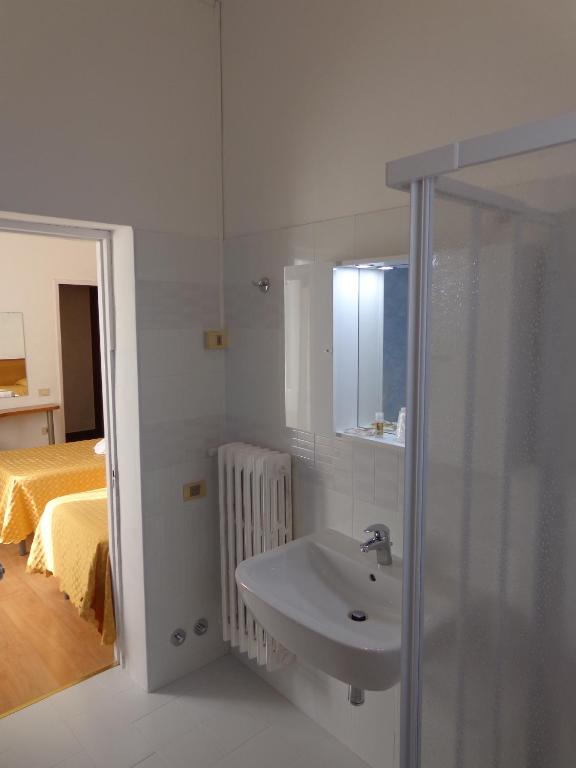 Koupelna v ubytování Hotel Loreto