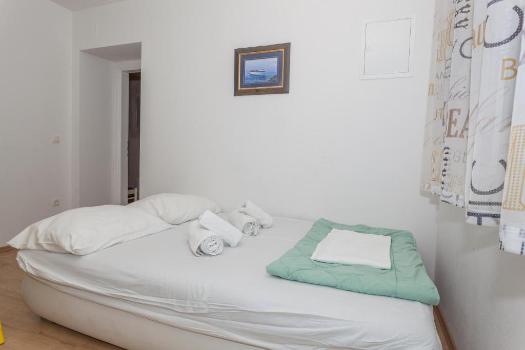 Posteľ alebo postele v izbe v ubytovaní Apartment Dome