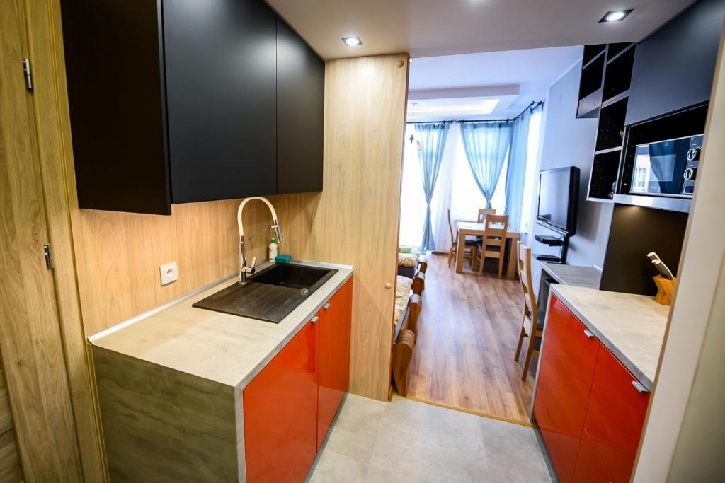 Η κουζίνα ή μικρή κουζίνα στο Apartament Cis przy Deptaku