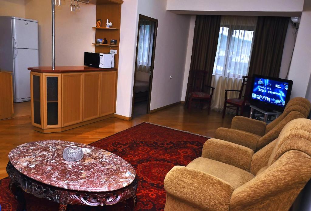 TV a/nebo společenská místnost v ubytování MGA Hostel & Tours