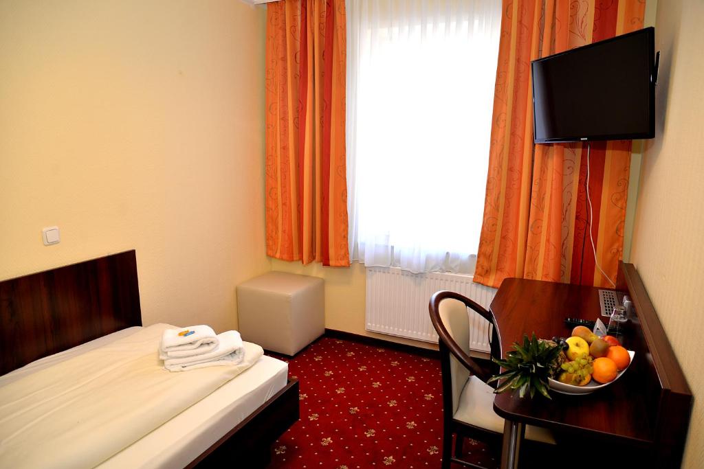 TV a/nebo společenská místnost v ubytování Hotel Neugrabener Hof