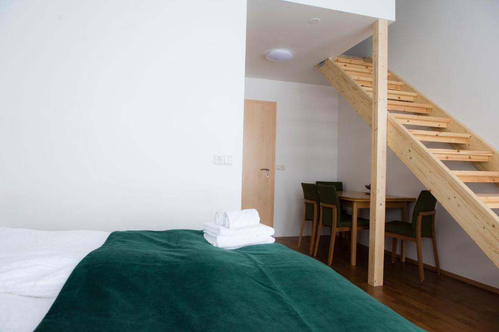 Postel nebo postele na pokoji v ubytování Media Luna Guesthouse