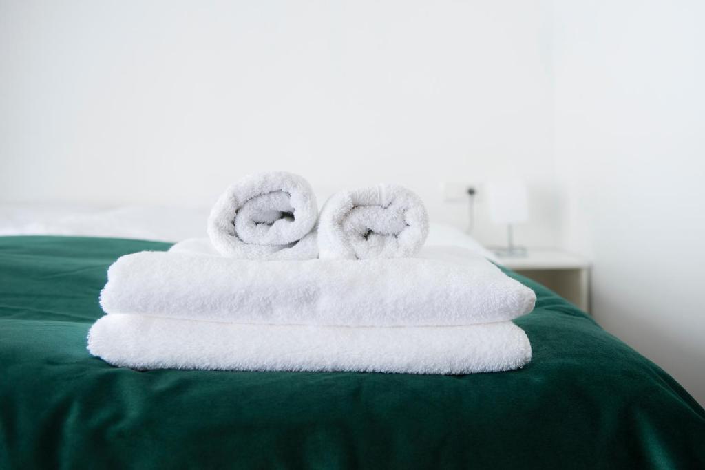 Postel nebo postele na pokoji v ubytování Media Luna Guesthouse