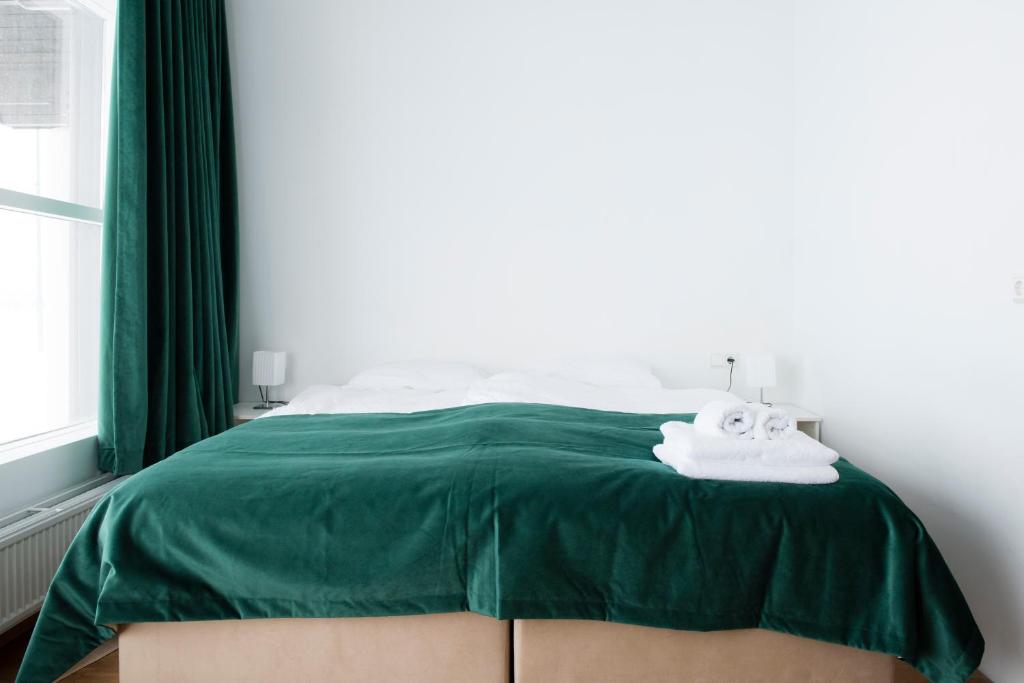 Postel nebo postele na pokoji v ubytování Media Luna Guesthouse