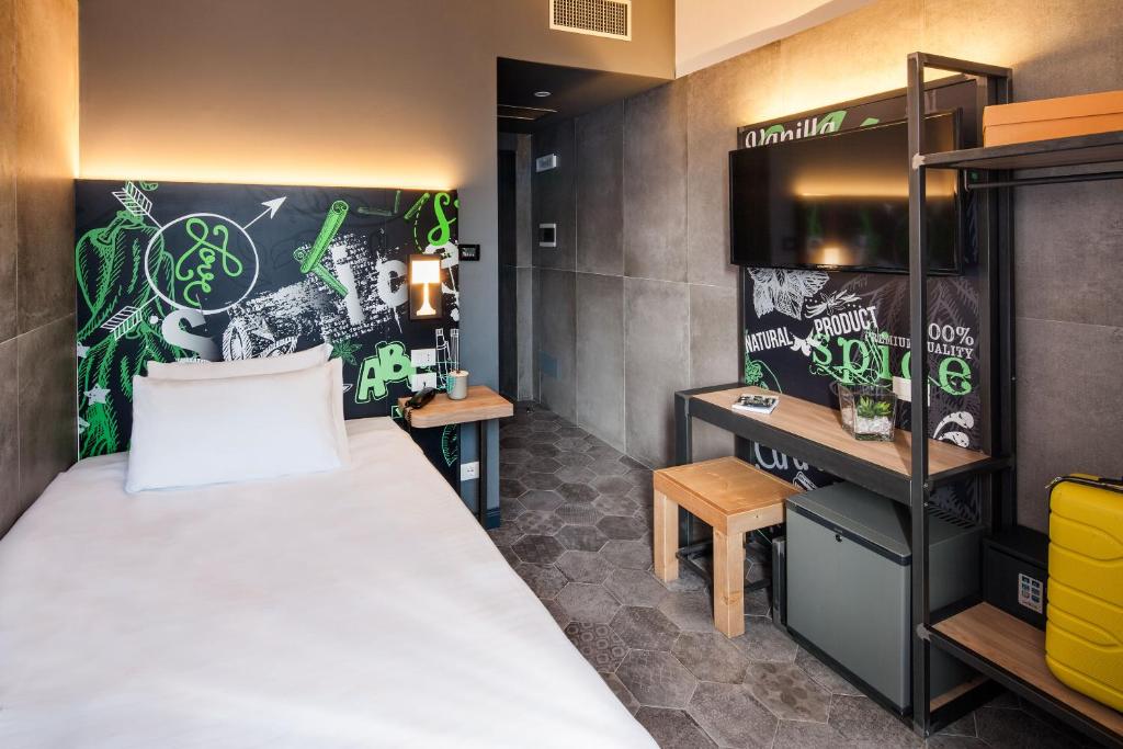 Postel nebo postele na pokoji v ubytování Spice Hotel Milano