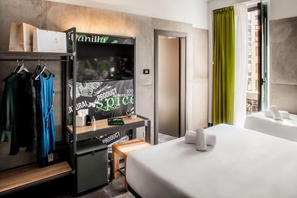 Postel nebo postele na pokoji v ubytování Spice Hotel Milano