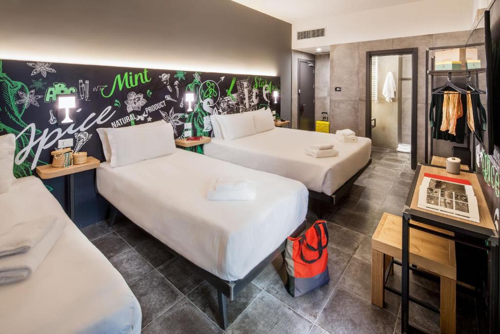 Postel nebo postele na pokoji v ubytování Spice Hotel Milano