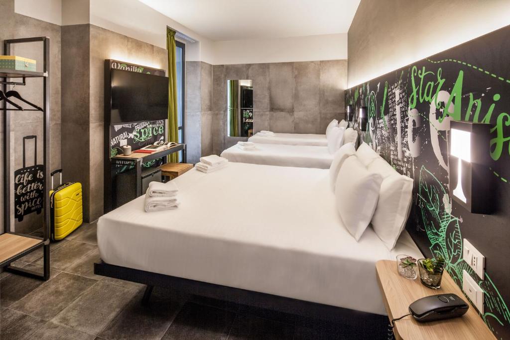 Postel nebo postele na pokoji v ubytování Spice Hotel Milano