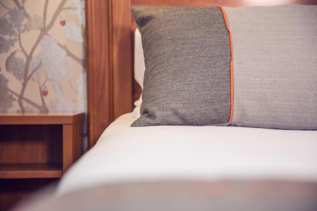 Postel nebo postele na pokoji v ubytování Timhotel Tour Eiffel