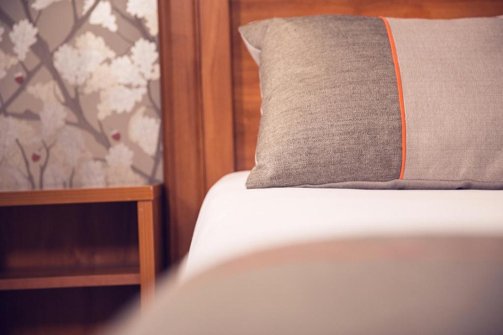 Postel nebo postele na pokoji v ubytování Timhotel Tour Eiffel