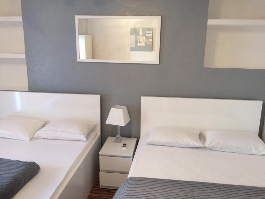 Postel nebo postele na pokoji v ubytování Rooms Pama