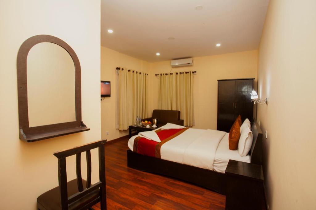 Postel nebo postele na pokoji v ubytování Hotel Dream City