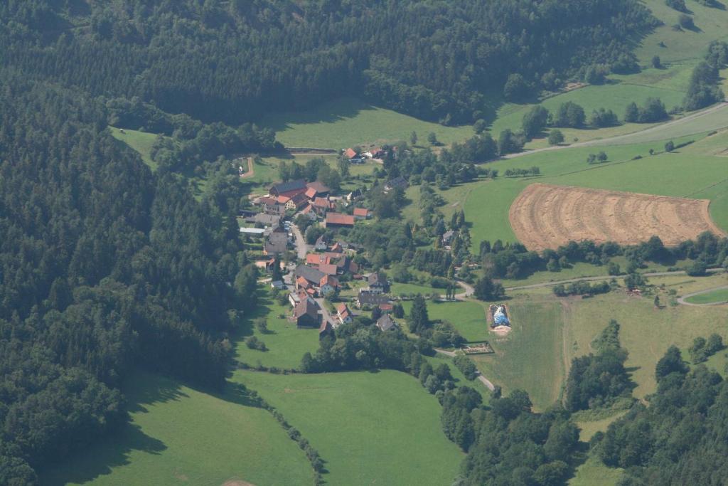 an aerial view of a small village in a field at Ferienwohnung Gareus in Zittenfelden