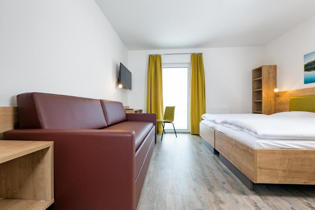 Postel nebo postele na pokoji v ubytování Cleverhotel