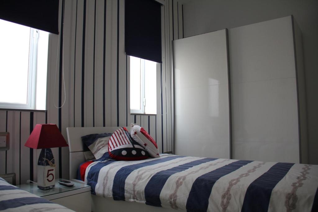 Postel nebo postele na pokoji v ubytování Marsascala Interlace Apartment with free parking