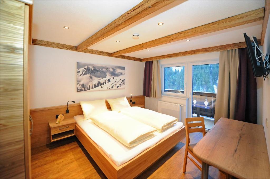 Posteľ alebo postele v izbe v ubytovaní Appartement Berghof