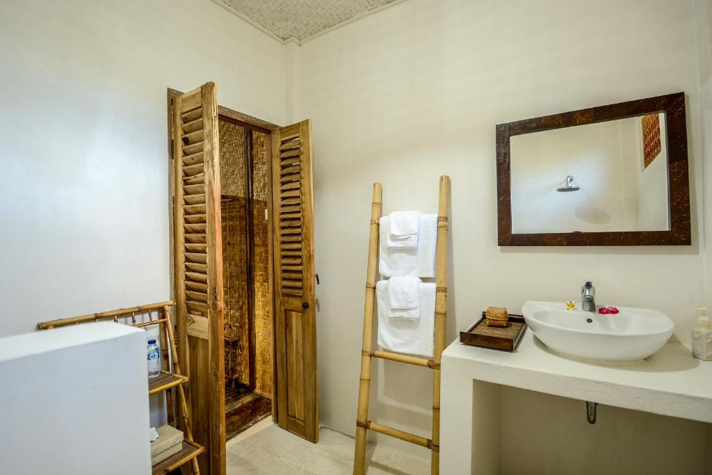 Koupelna v ubytování Aashaya Jasri Resort