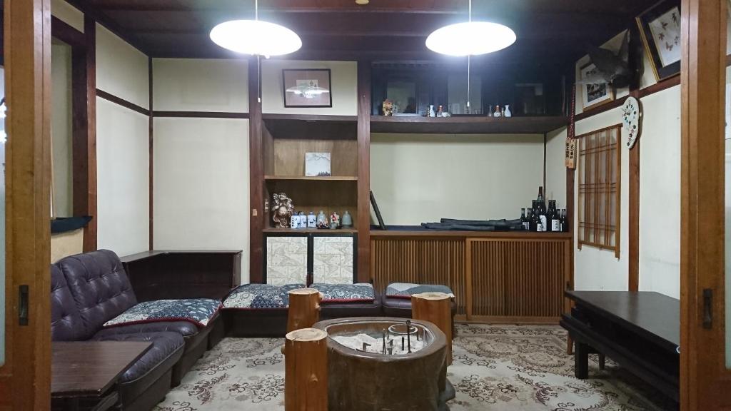 Kuchyň nebo kuchyňský kout v ubytování 柏屋旅館＜シェアハウス&ゲストハウス＞