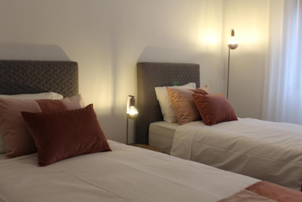 Postel nebo postele na pokoji v ubytování Holiday Cascais Apartment