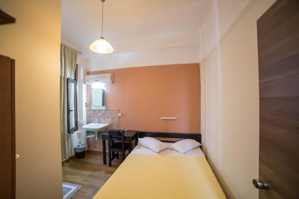 Posteľ alebo postele v izbe v ubytovaní Tempi Hotel
