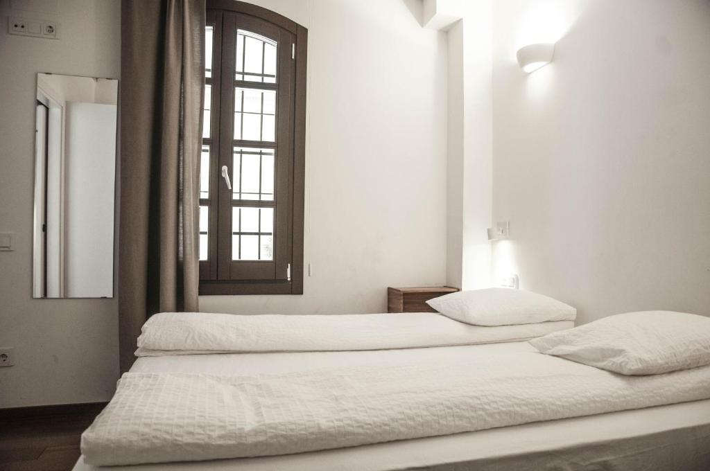 Postel nebo postele na pokoji v ubytování Barcelona Beach Apartments
