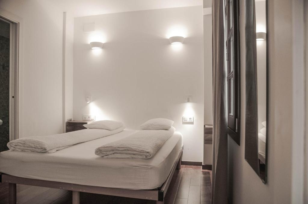 Postel nebo postele na pokoji v ubytování Barcelona Beach Apartments