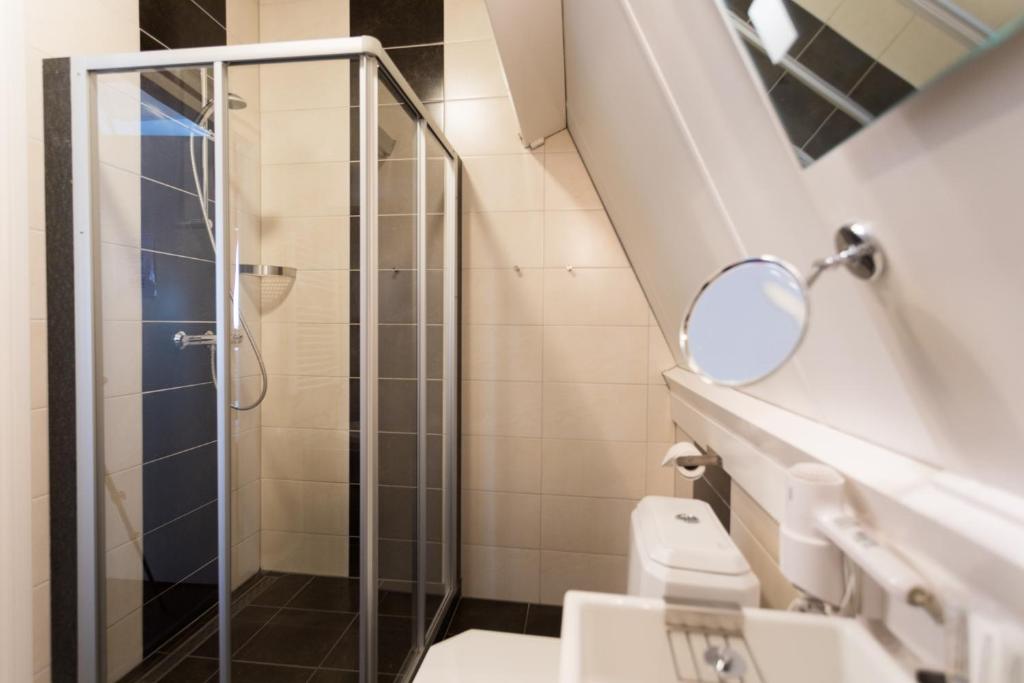 Koupelna v ubytování Hotel Zilt