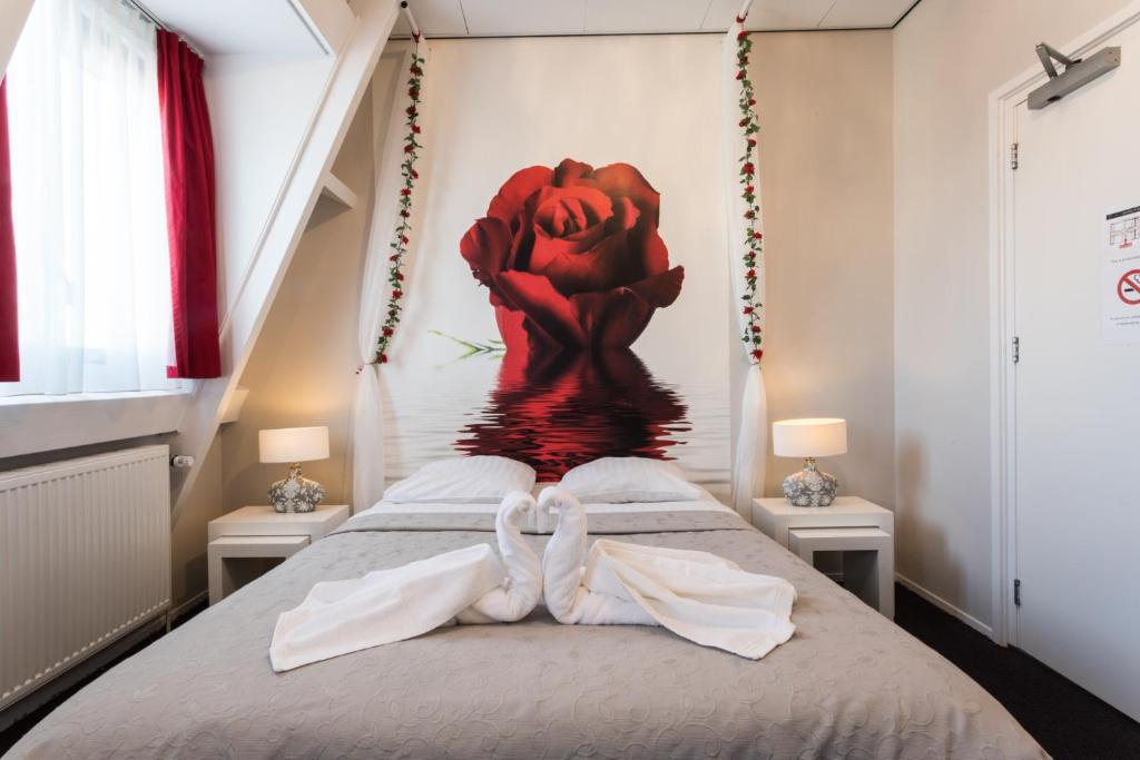 Postel nebo postele na pokoji v ubytování Hotel Zilt